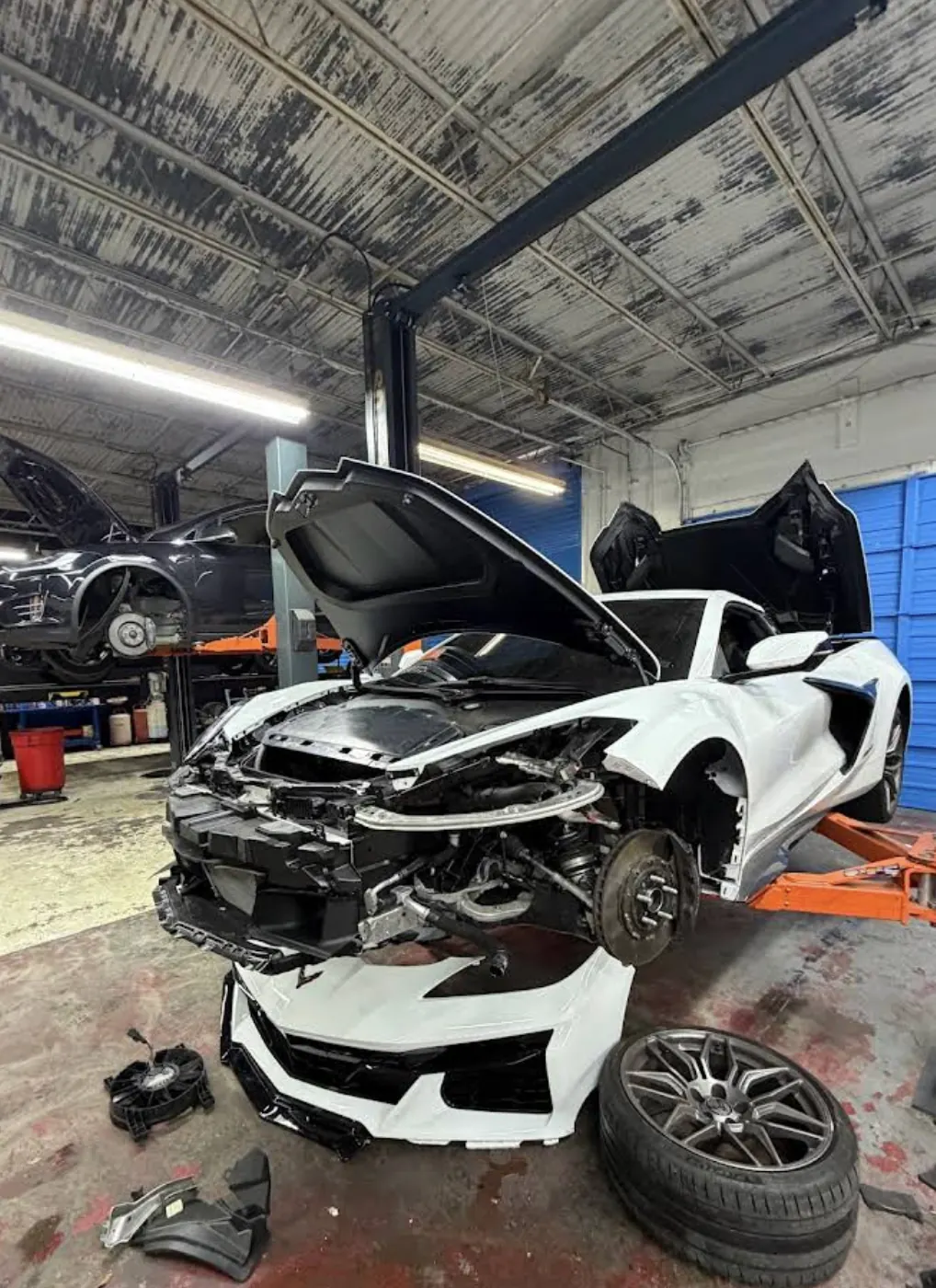 Insurance claim collision repair for front-end vehicle damage at American Auto near Sugar Land, TX
