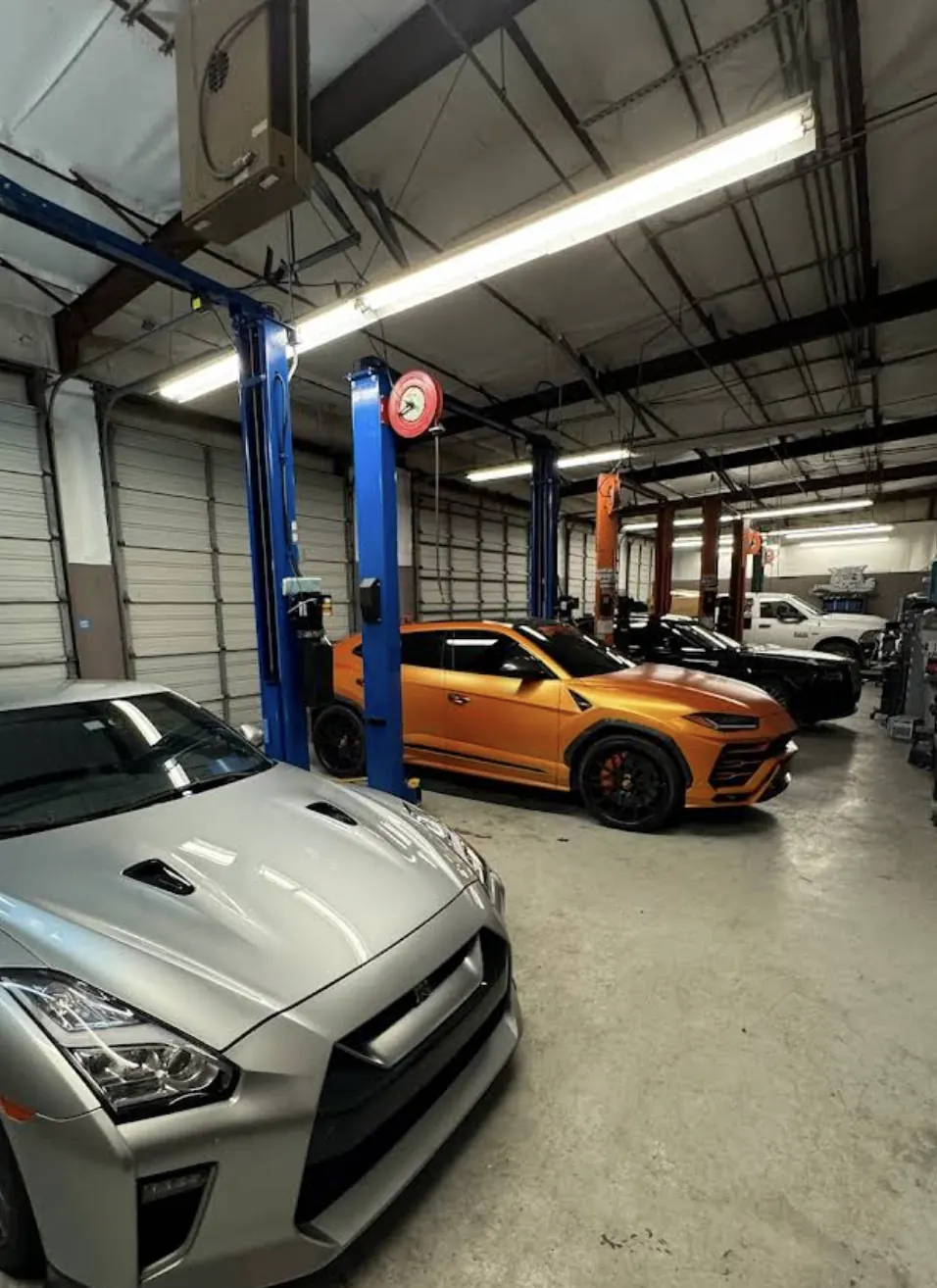 American Auto service bays for transparent auto repair near Sugar Land, TX